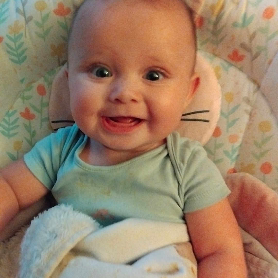 Inaya-Love joined the competition — help win amazing prizes! baby, blanket, child, clothing, colorful, comfort, cushion, cute, face, happy, head, indoor, infant, pattern, person, portrait, sitting, smiling, soft, toy