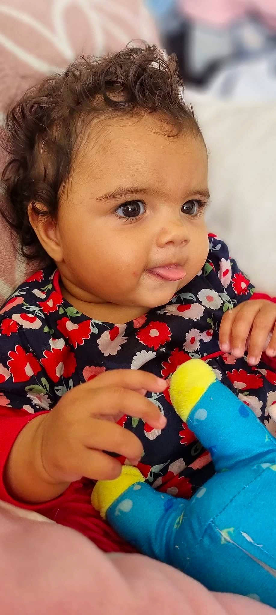 Jaynayah participe au concours pour gagner de l'argent avec cette photo : baby_playing_with_toys, baby_toddler_clothing, cheek, chin, dress, eye, eyelash, face, finger, hairstyle, hand, head, iris, lip, mouth, nose, organ, person, product, skin