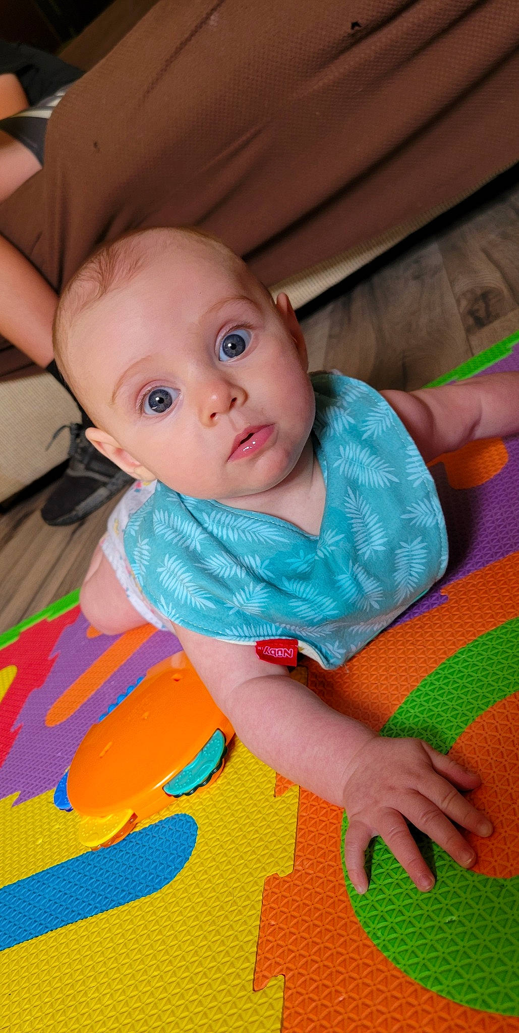 Tahlia is registered to the contest to win money with this photo: baby, baby_products, baby_toddler_clothing, cheek, child, comfort, eye, finger, flooring, fun, happy, iris, mouth, nose, person, sitting, skin, sleeve, surprise, textile