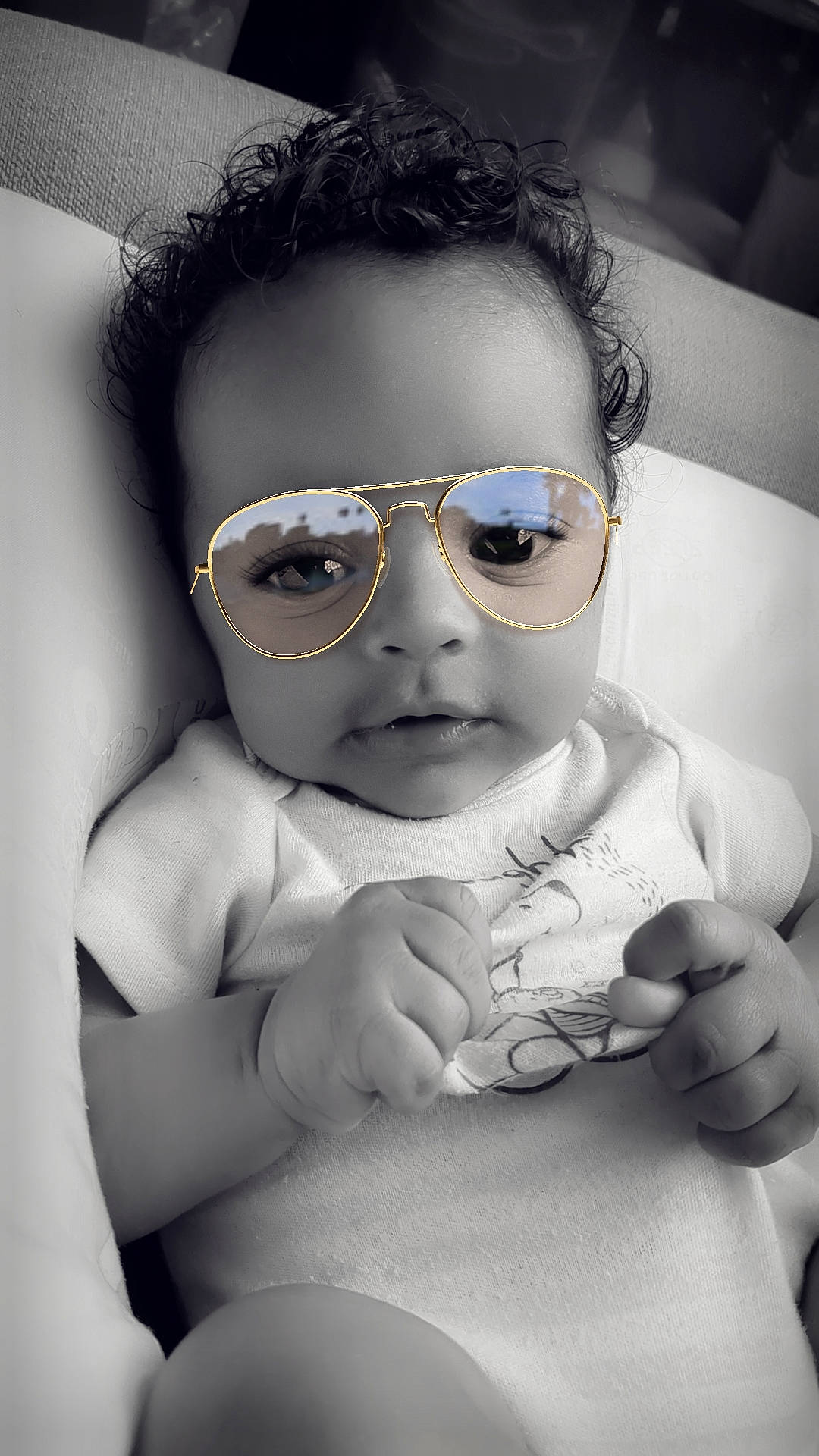 Hermione is registered to the contest to win money with this photo: baby, black_and_white, cheek, cool, eyebrow, eyelash, eyewear, facial_expression, flash_photography, gesture, glasses, goggles, happy, lip, mouth, nose, person, skin, style, toddler