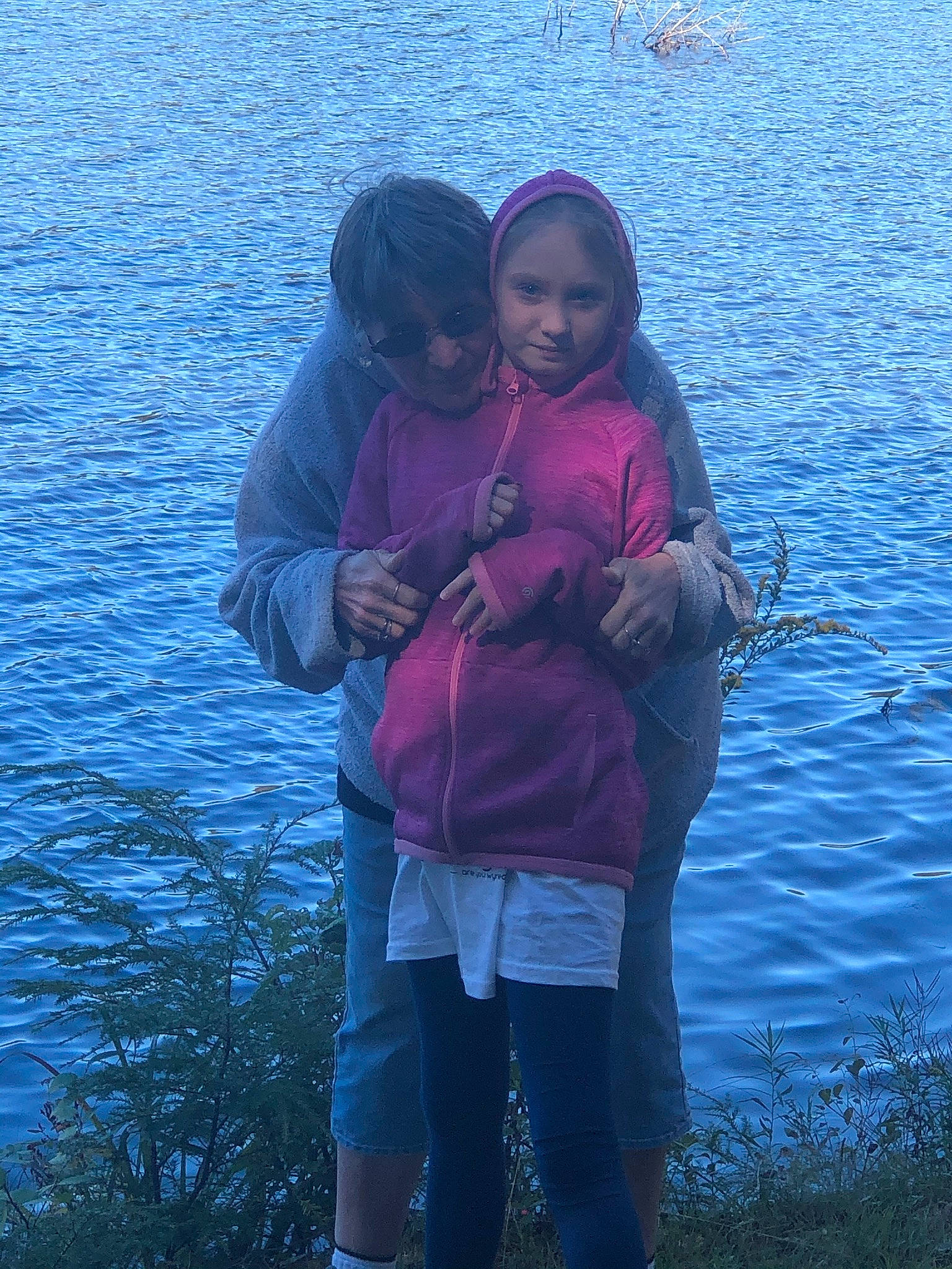 Cheyanne joined the competition — help win amazing prizes! azure, blue, coast, electric_blue, fun, gesture, grass, happy, horizon, jacket, lake, leisure, magenta, people_in_nature, person, shore, shorts, toddler, travel, under_exposed