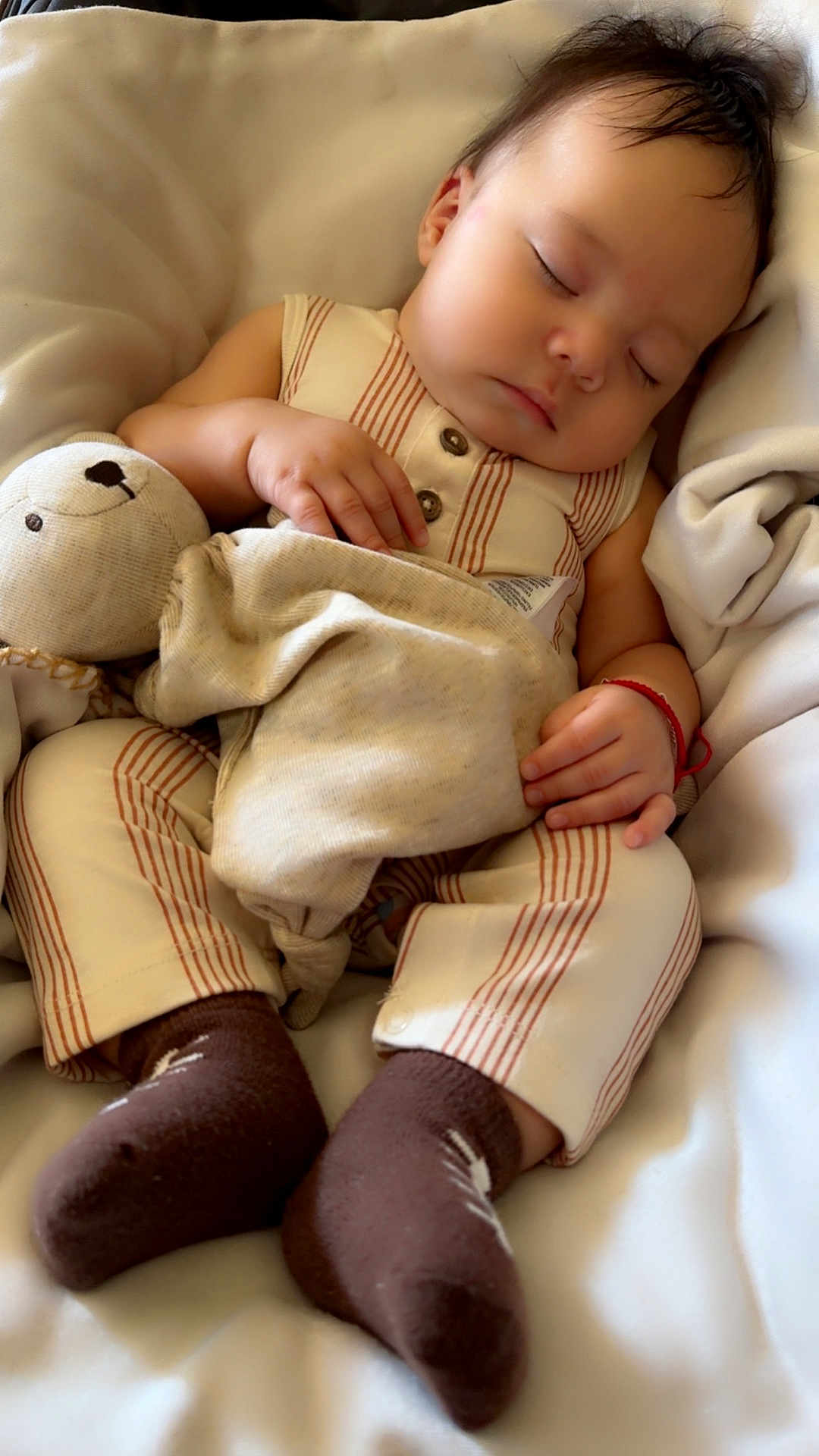 Sebastián joined the competition — help win amazing prizes! baby, sleeping, pajamas, teddy_bear, blanket, brown_socks, child, cute, cozy, rest, peaceful, indoor, soft_toys, infant, portrait, hands, face, comfort, relaxation, childhood