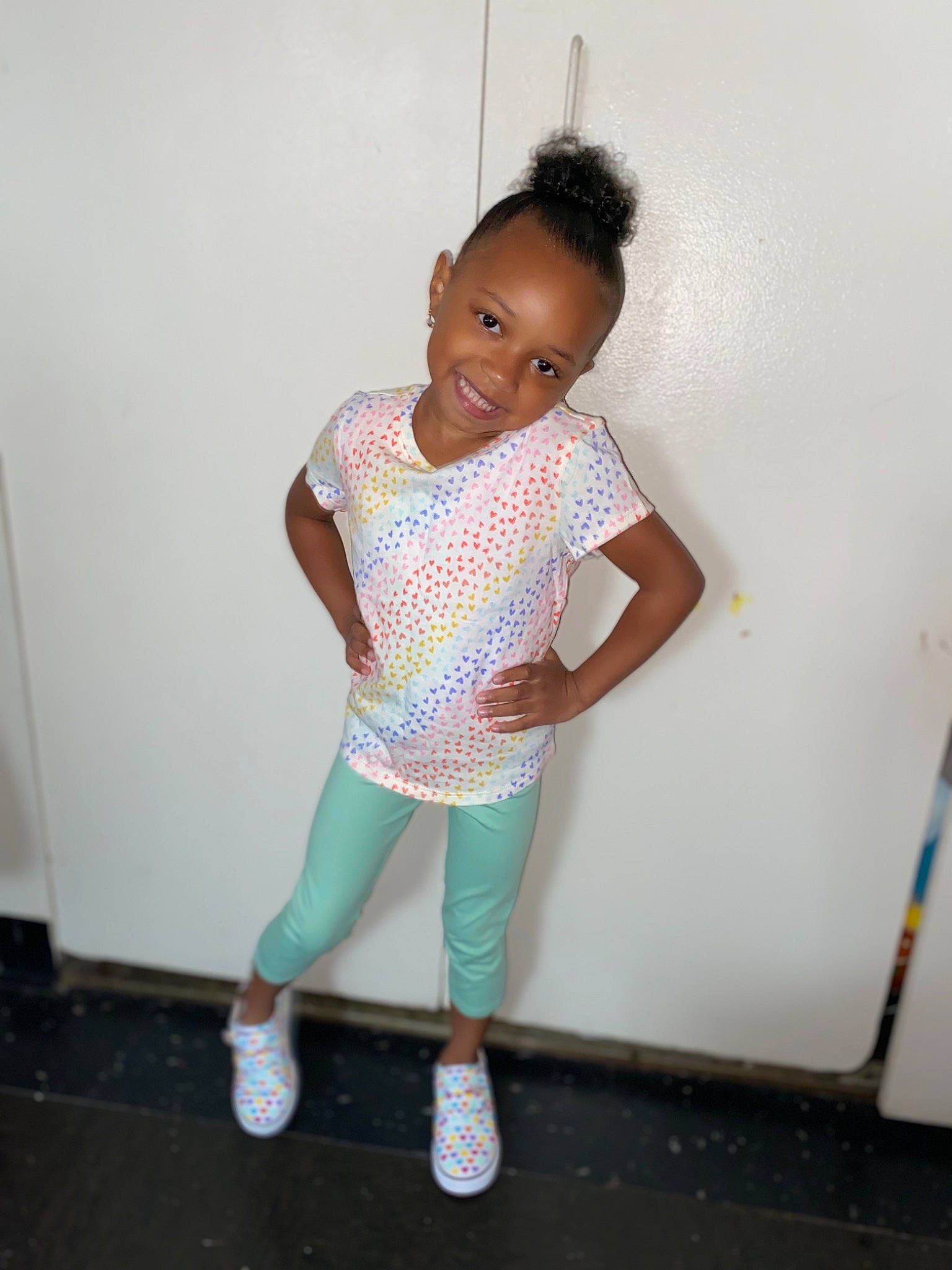 Amiyah is registered to the contest to win money with this photo: arm, baby_toddler_clothing, calf, fashion_design, fun, hair, happy, human_body, joint, joy, knee, leg, person, shoe, shoulder, sleeve, sock, sportswear, t_shirt, thigh