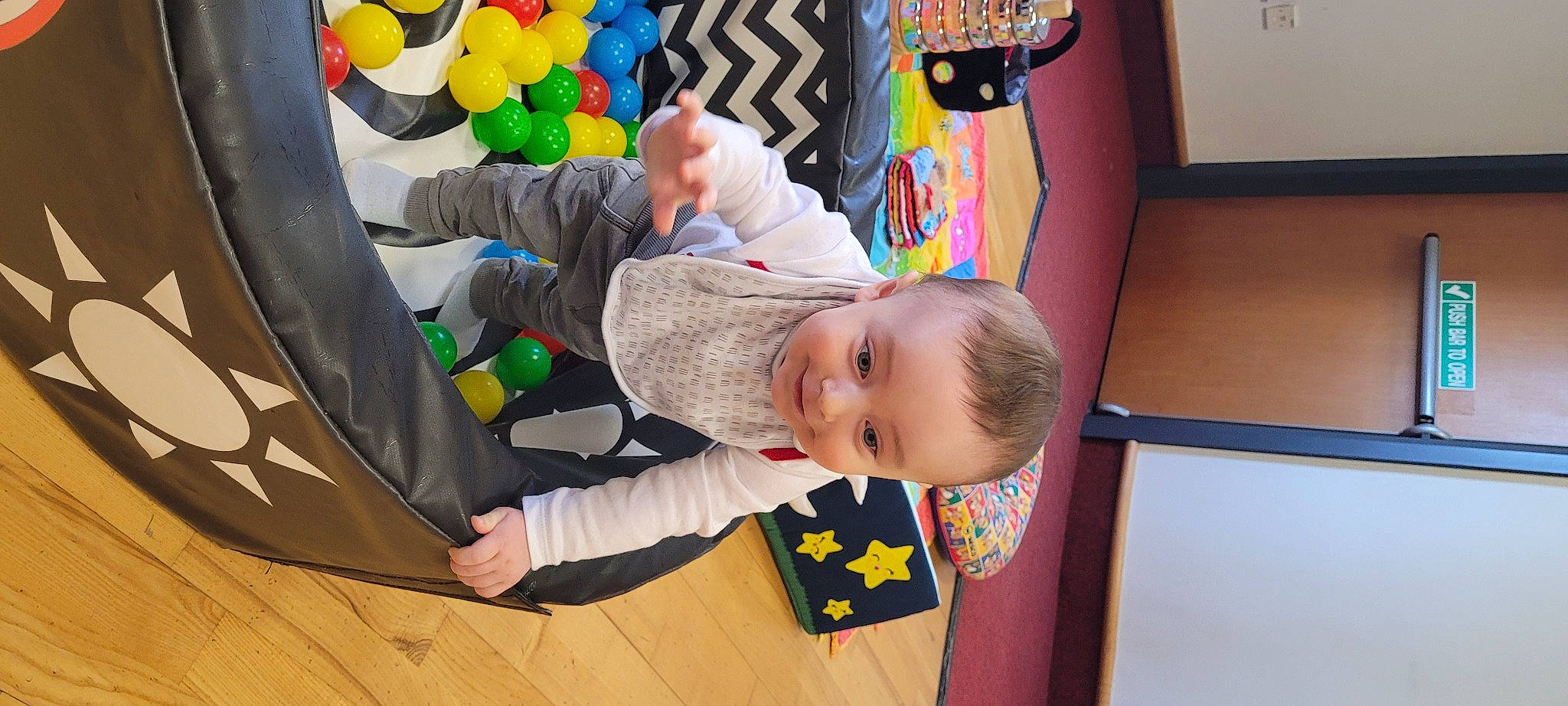 Jake is registered to the contest to win money with this photo: baby, baby_products, baby_toddler_clothing, child, design, event, flooring, fun, happy, hardwood, joy, person, photograph, play, product, room, smile, snapshot, toddler, varnish