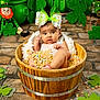 Reynesmae is registered to the contest to win money with this photo: baby, barrel, cereal, bow, rainbow, green, shamrock, leprechaun, doll, pot, floor, decor, cute, infant, child, indoors, celebration, holiday, festive, smile