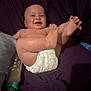 Jesse joined the competition — help win amazing prizes! baby, bare_skin, bottle, child, cute, diaper, drool, feet, hand, happy, human, indoors, infant, lying_down, playful, purple_blanket, relaxed, small, smile, young