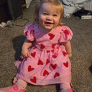 Cheyenne joined the competition — help win amazing prizes! child, toddler, girl, pink_dress, hearts, smile, sitting, carpet, sparkly_shoes, bow, hair, happy, portrait, indoor, toys, cardboard_box, clothing, cute, baby, face