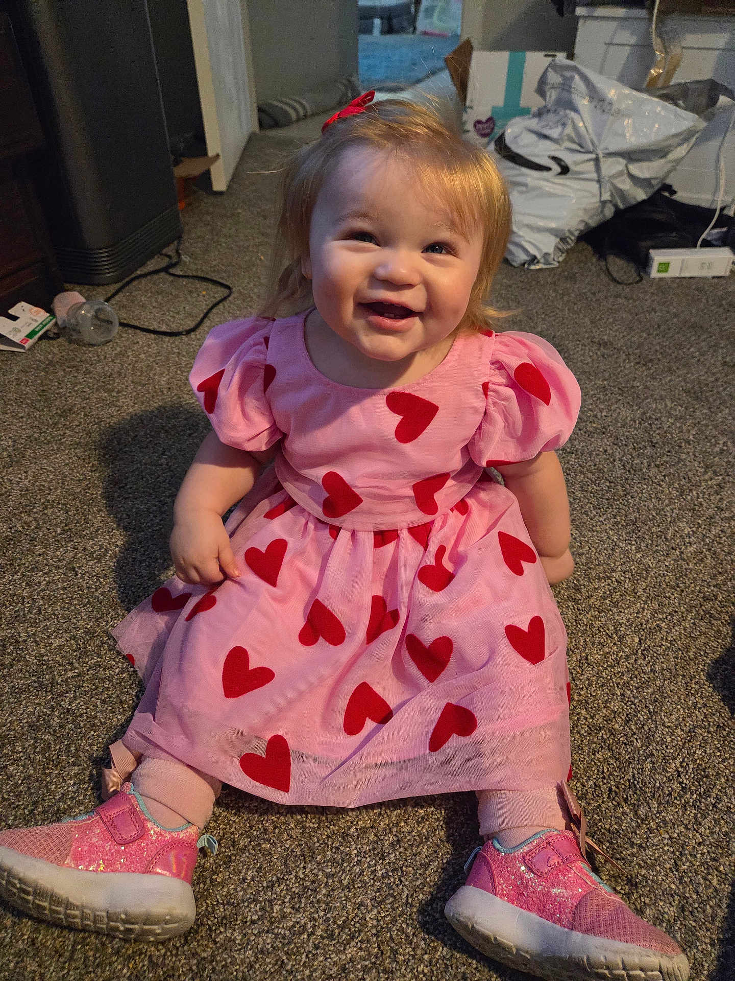Cheyenne joined the competition — help win amazing prizes! child, toddler, girl, pink_dress, hearts, smile, sitting, carpet, sparkly_shoes, bow, hair, happy, portrait, indoor, toys, cardboard_box, clothing, cute, baby, face