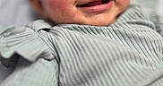 Marleigh joined the competition — help win amazing prizes! baby, child, smile, face, cheeks, clothing, green, ribbed, happy, portrait, skin, infant, cute, closeup, young, person, hand, indoors, expression, baby_girl
