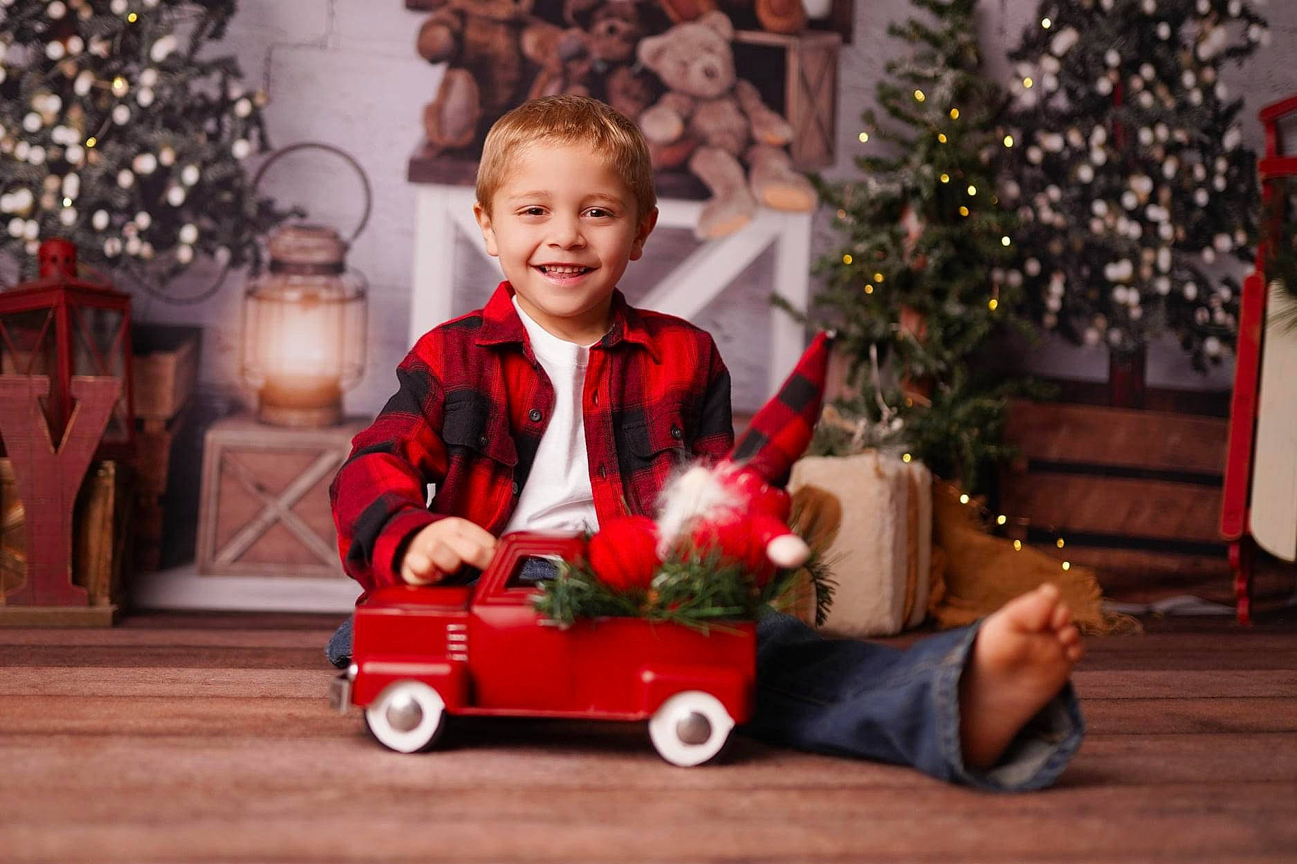 Jonathan joined the competition — help win amazing prizes! baby, christmas, christmas_decoration, christmas_ornament, christmas_tree, event, facial_expression, fun, happy, holiday, holiday_ornament, joy, ornament, person, smile, snapshot, tire, toddler, tree, vehicle