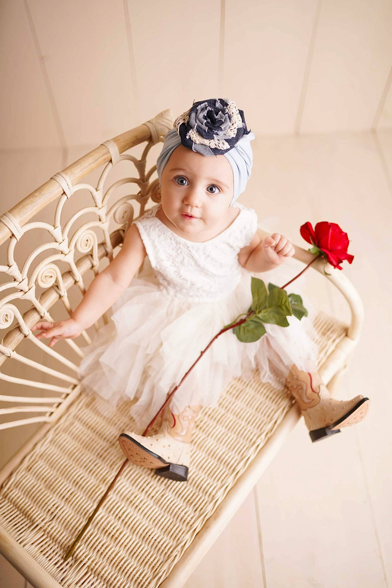 Josephine is registered to the contest to win money with this photo: baby, baby_toddler_clothing, bridal_accessory, child, dress, embellishment, eye, fashion_accessory, flash_photography, flooring, flower, happy, headband, headpiece, headwear, pattern, person, petal, plant, rose