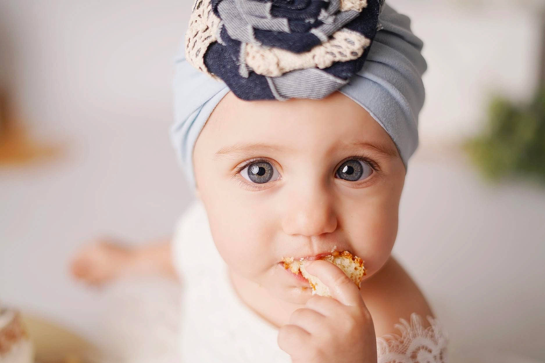 Josephine joined the competition — help win amazing prizes! baby, cap, child, eyelash, fashion_accessory, finger, food_craving, gesture, hand, happy, hat, headgear, headpiece, headwear, jewellery, lip, nail, nose, person, skin