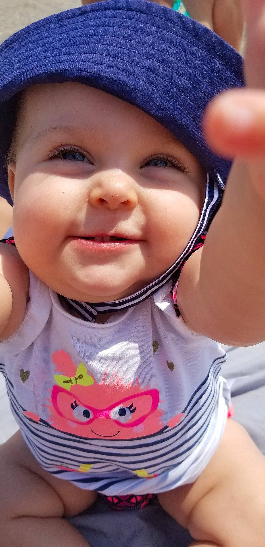 Reagan joined the competition — help win amazing prizes! cheek, child, cool, eye, face, finger, girl, hand, happiness, head, headgear, infant, lip, mouth, nose, person, product, skin, smile, toddler