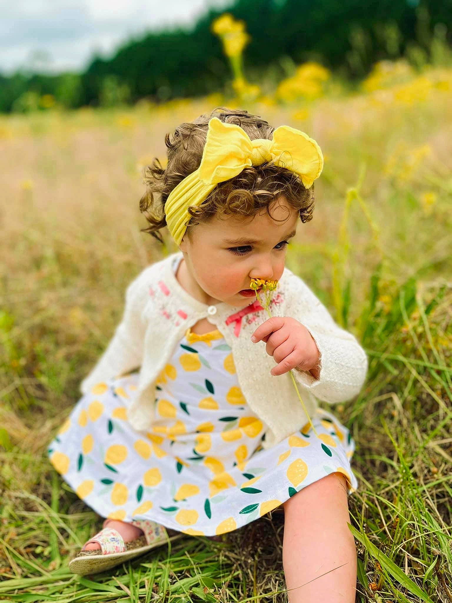 Karli joined the competition — help win amazing prizes! baby, baby_toddler_clothing, cap, child, eyewear, fashion_accessory, fun, grass, grass_family, grassland, happy, hat, landscape, meadow, pattern, people_in_nature, person, plant, prairie, recreation