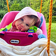 Rosedale joined the competition — help win amazing prizes! baby, child, swing, pink_hoodie, blue_eyes, little_tikes, blanket, plush_toy, orange_rope, outdoor, greenery, grass, tree, cute, infant, seat, play, portrait, childhood, nature
