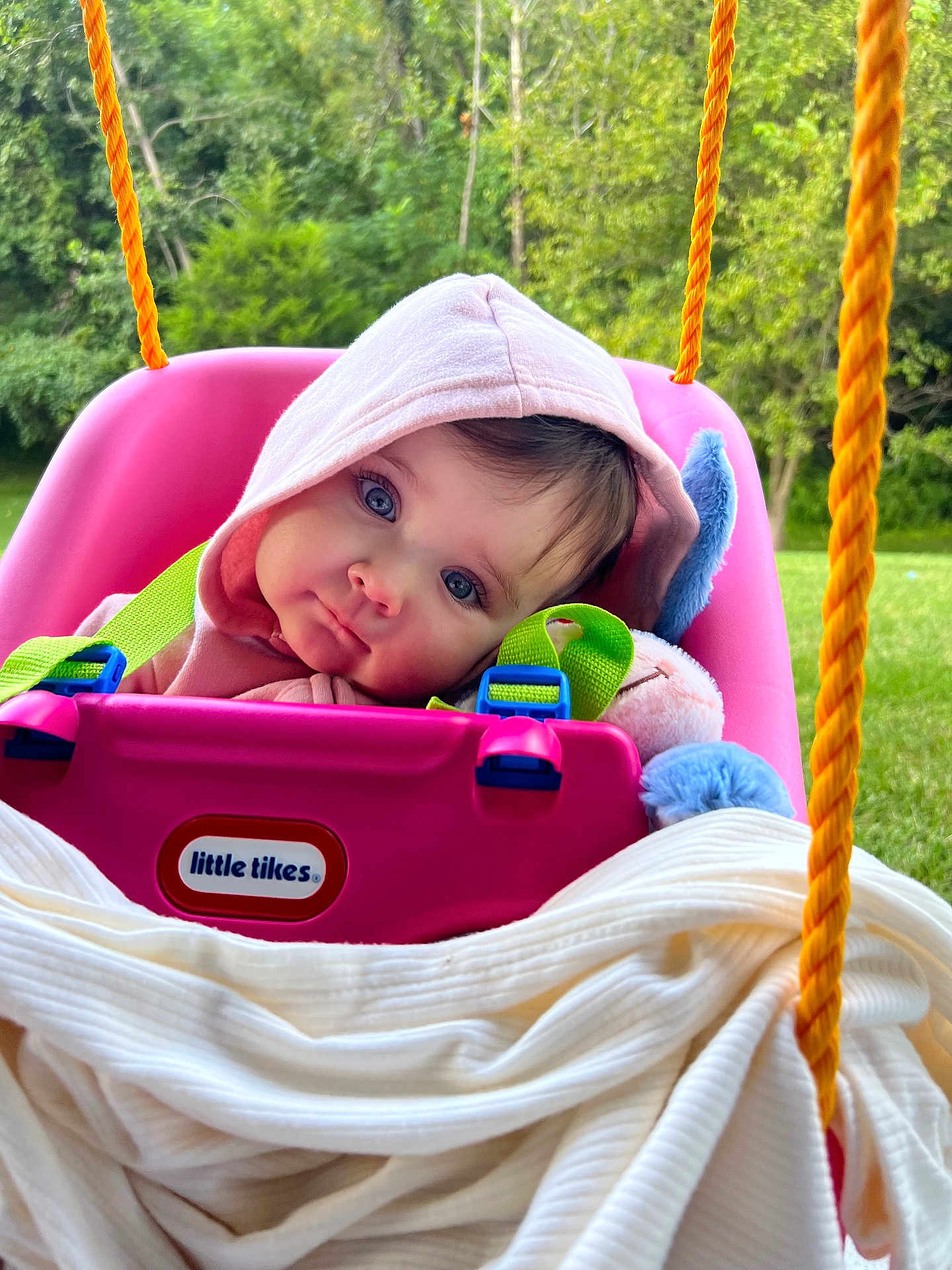 Rosedale joined the competition — help win amazing prizes! baby, child, swing, pink_hoodie, blue_eyes, little_tikes, blanket, plush_toy, orange_rope, outdoor, greenery, grass, tree, cute, infant, seat, play, portrait, childhood, nature