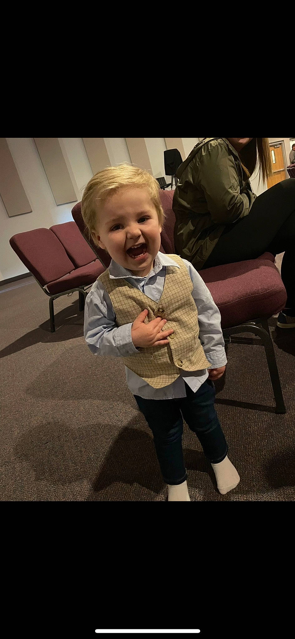 Jamison joined the competition — help win amazing prizes! baby, baby_toddler_clothing, chair, child, comfort, floor, flooring, fun, gesture, happy, human_leg, lap, person, room, shoulder, sitting, sleeve, smile, t_shirt, thigh