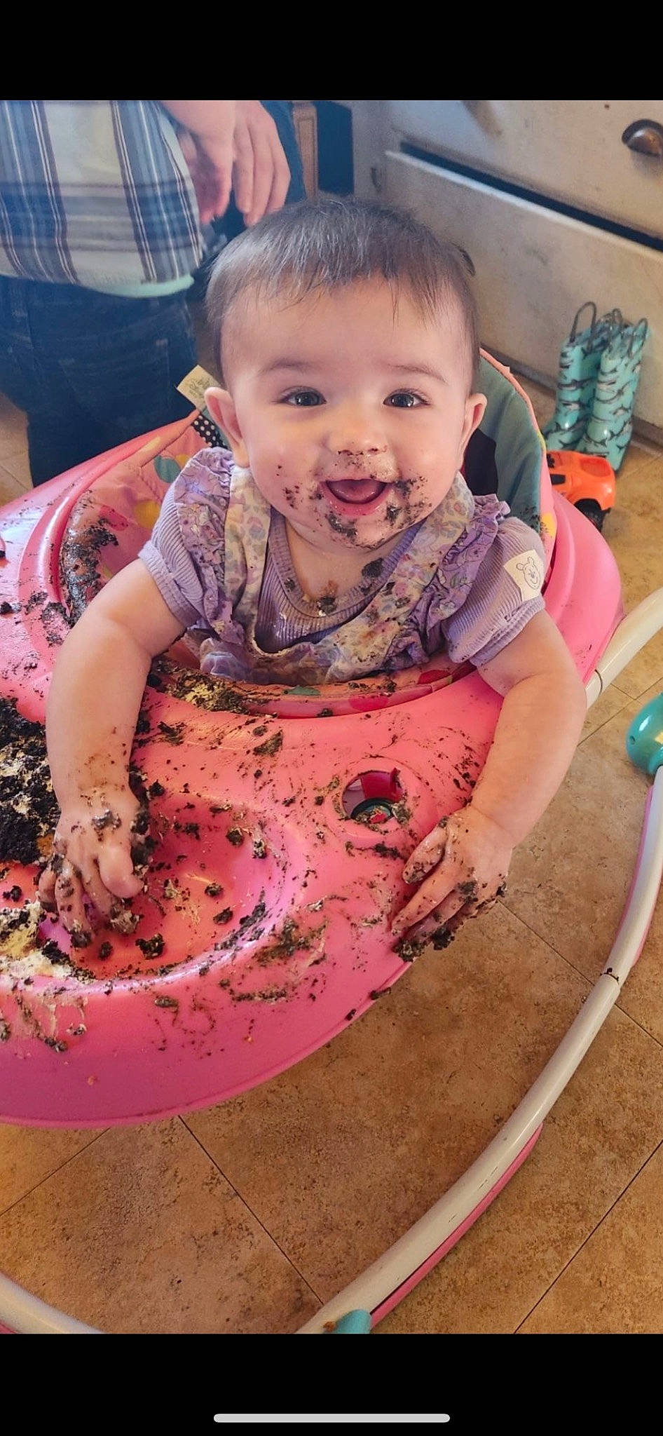 Sadie-mae is registered to the contest to win money with this photo: baby, baby_toddler_clothing, cheek, child, circle, eye, flooring, fun, happy, head, hose, mouth, person, pink, play, sitting, skin, smile, t_shirt, toddler