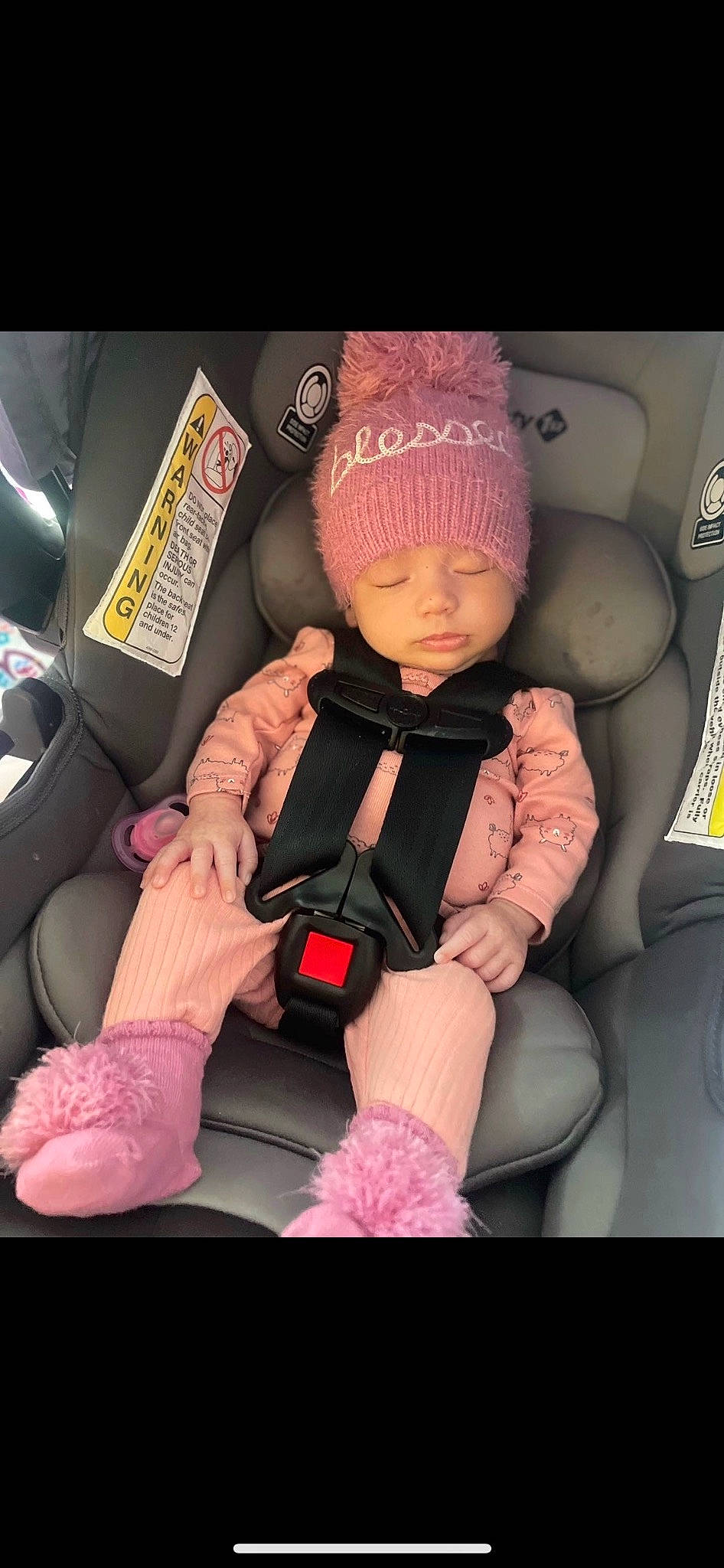 Sadie-mae is registered to the contest to win money with this photo: auto_part, automotive_design, cap, car_seat, car_seat_cover, carmine, child, comfort, family_car, finger, head_restraint, headwear, luxury_vehicle, magenta, nail, person, pink, seat_belt, steering_wheel, thigh