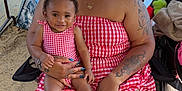 Kayley joined the competition — help win amazing prizes! baby, beach, child, family, happy, jewelry, matching_outfits, mother, outdoor, people, picnic, red_gingham, sand, sandals, sitting, smiling, stroller, summer, tattoos, woman