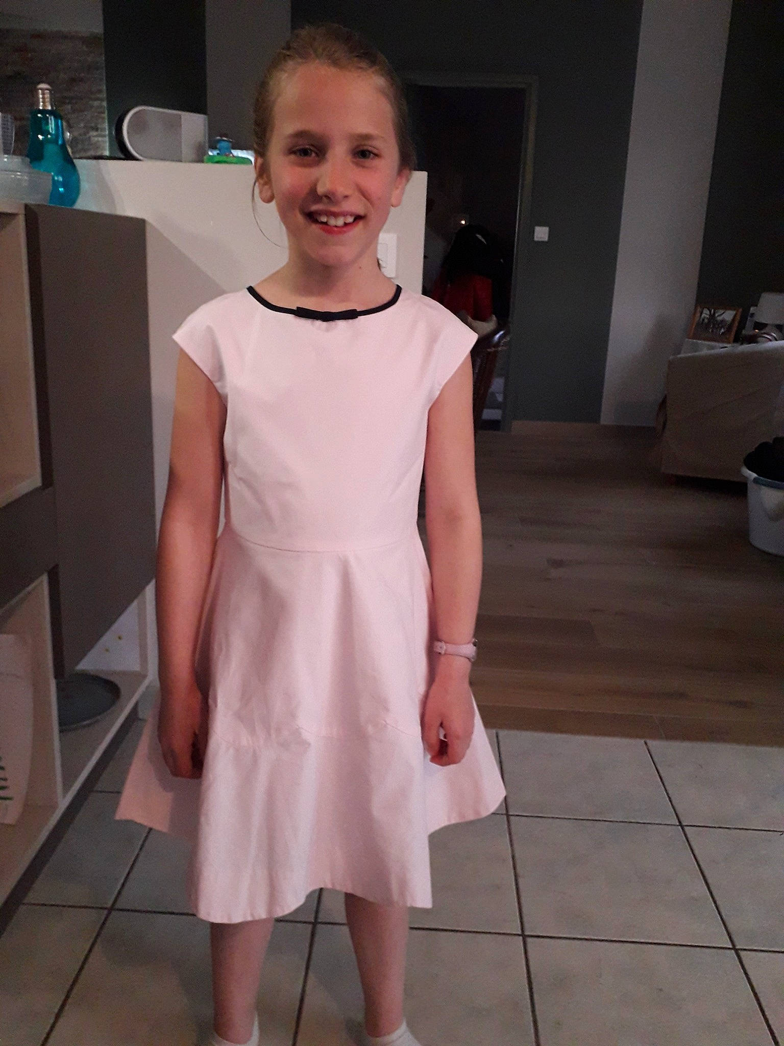 Amandine participe au concours pour gagner de l'argent avec cette photo : child, clothing, dress, joy, person, pink, shoulder, smile, toddler, white