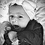 Valencia joined the competition — help win amazing prizes! baby, infant, headband, bow, pacifier, clothing, hand, face, portrait, cute, black_and_white, soft_fabric, newborn, expression, lying_down, child, comfort, close_up, adorable, toddler