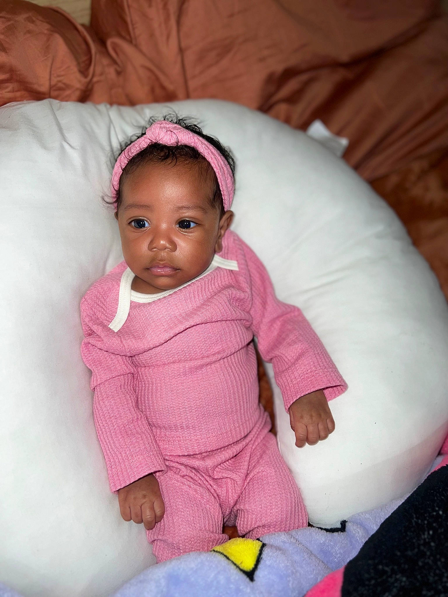 Nyomi joined the competition — help win amazing prizes! baby, baby_toddler_clothing, cheek, comfort, eye, face, finger, fun, head, human_body, linens, lip, mammal, mouth, nose, person, pink, purple, skin, sleeve