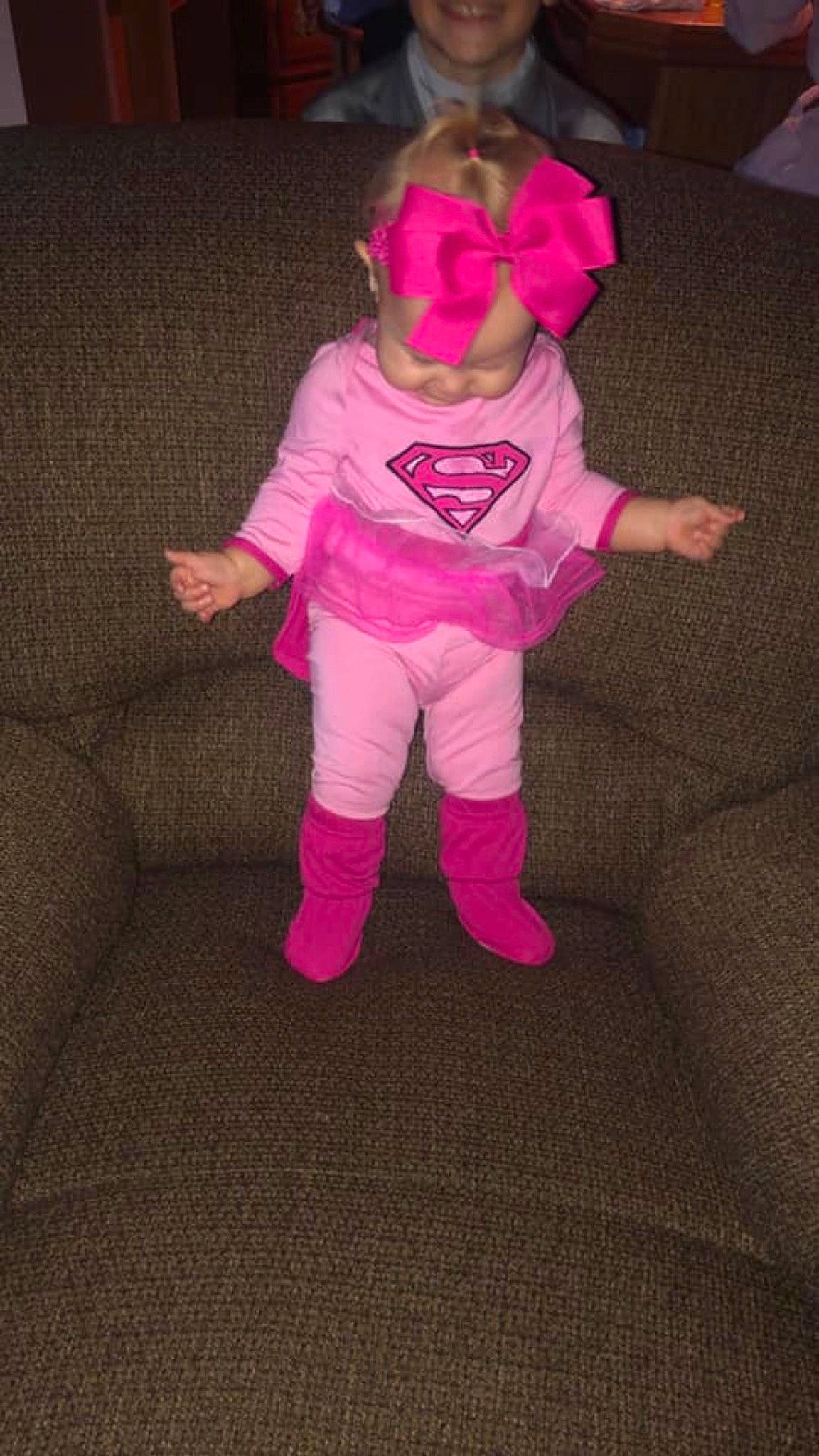 Madalyn is registered to the contest to win money with this photo: baby_toddler_clothing, carmine, eye, fictional_character, fun, fur, gesture, glove, head, human_body, leg, magenta, person, pink, plush, purple, sleeve, sock, stuffed_toy, thumb