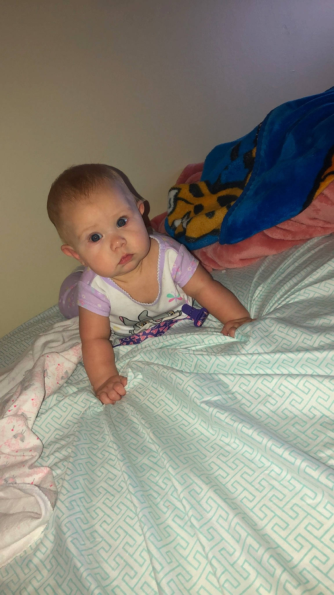 Madalyn joined the competition — help win amazing prizes! baby, baby_products, baby_toddler_clothing, bed, bedding, cheek, child, comfort, flooring, fun, head, iris, linens, pattern, person, room, sitting, sleeve, textile, toddler