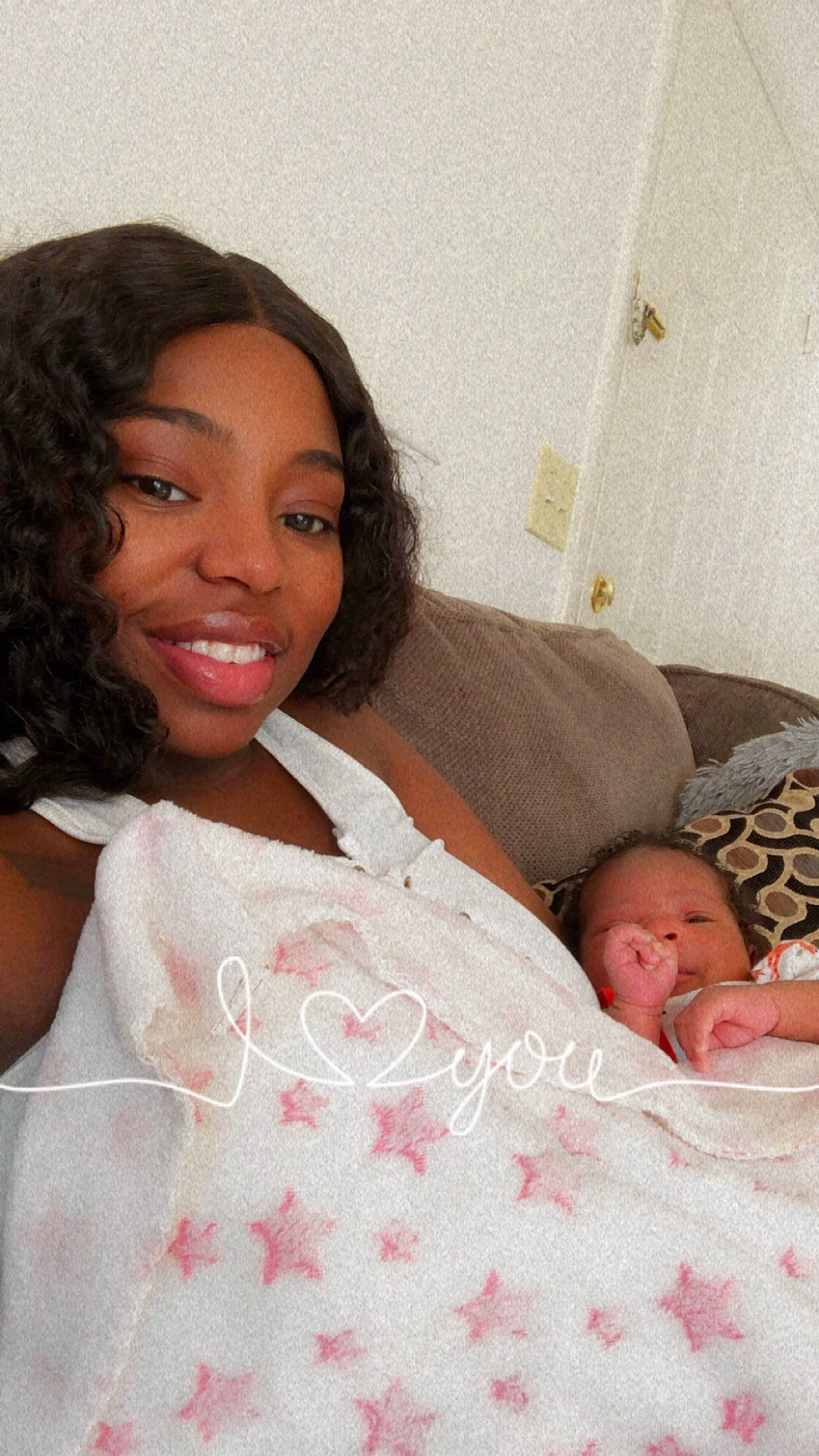 River Sage is registered to the contest to win money with this photo: abdomen, baby, black_hair, comfort, earrings, eye, eyebrow, eyelash, finger, happy, joy, linens, lip, makeover, muscle, neck, person, pink, skin, smile