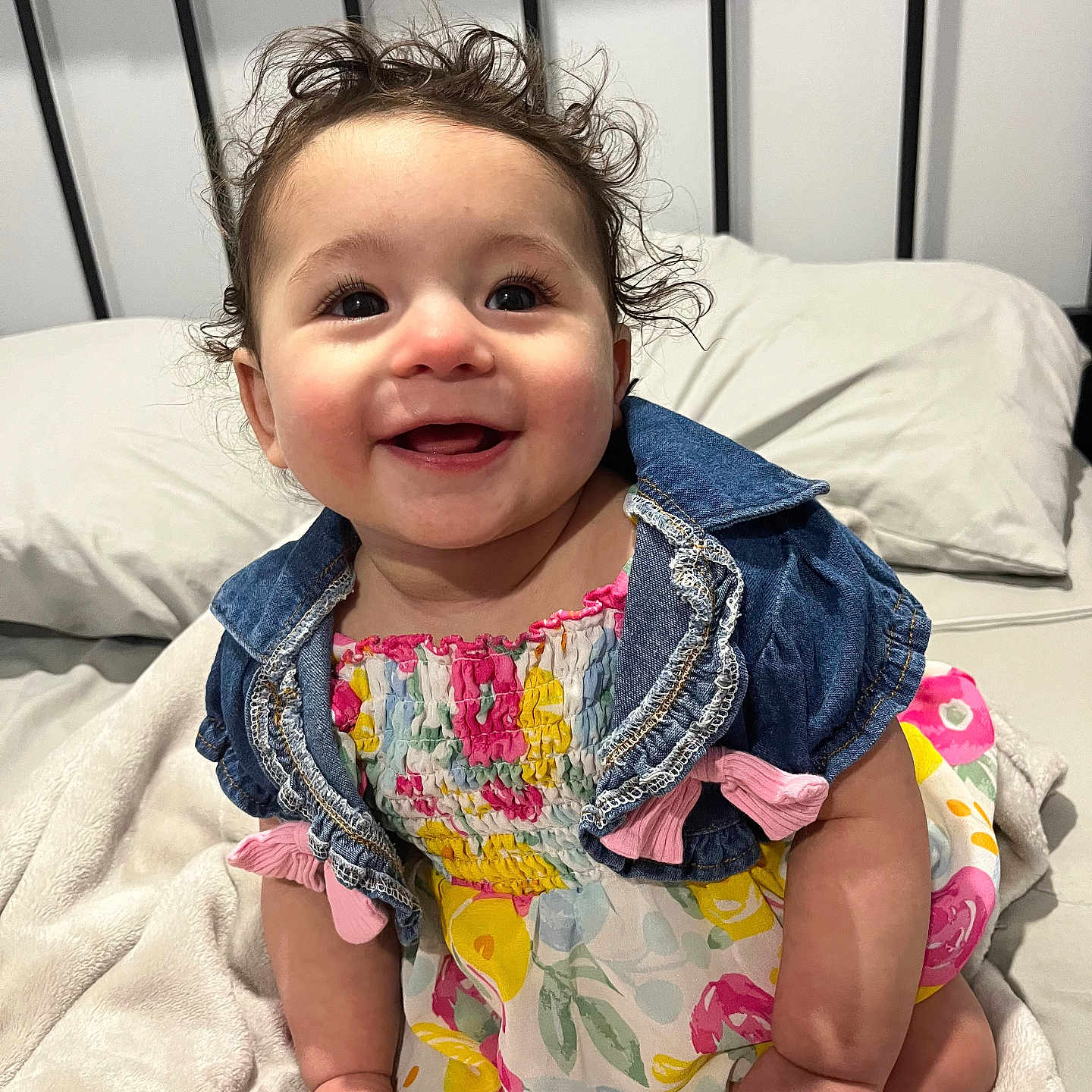 Raya joined the competition — help win amazing prizes! baby, babylaughing, bed, bedroom, clothing, cushion, face, furniture, happy, head, homedecor, indoors, jeans, pants, person, photography, portrait, room, sitting, smile