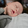 baby, sleeping, face, mouth_open, blanket, clothing, infant, rest, soft, closeup, head, peaceful, skin, portrait, young_child, indoors, warm, comfort, cuddle, cozy