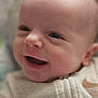 baby, smiling, face, infant, closeup, portrait, child, happy, cute, skin, eyes, mouth, clothing, zipper, beige, soft, indoors, newborn, head, expression
