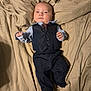 Alexander joined the competition — help win amazing prizes! baby, infant, formal_clothing, tie, vest, pants, socks, blanket, bed, portrait, cute, face, person, child, newborn, laying_down, indoors, comfortable, expression, clothing
