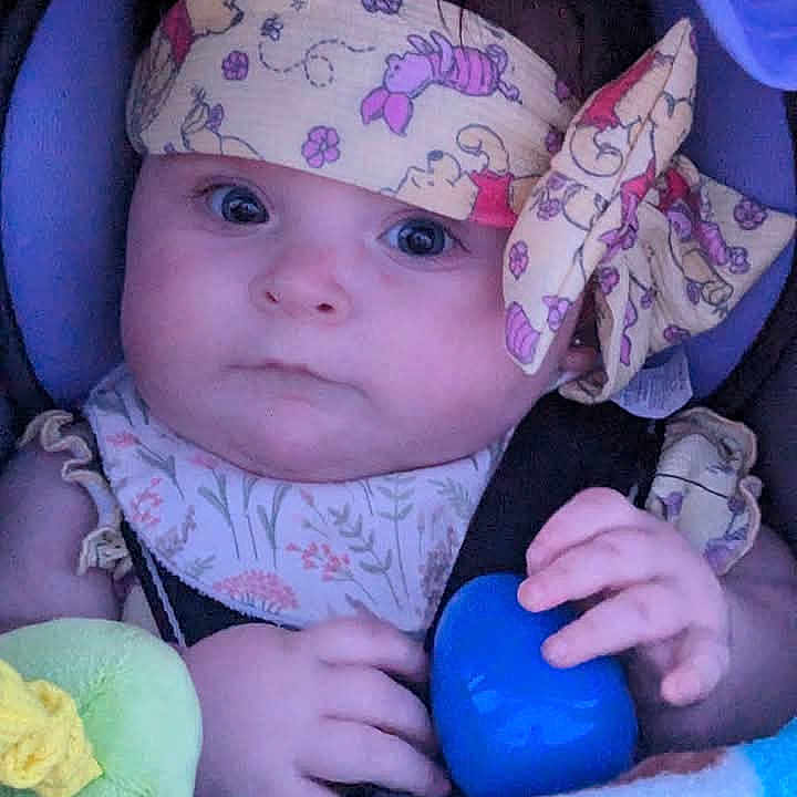 Yalanda Laura Dawn is registered to the contest to win money with this photo: accessories, baby, bodypart, clothing, cushion, face, finger, hand, happy, hat, head, headband, homedecor, newborn, person, photography, portrait, smile, sunglasses, toy