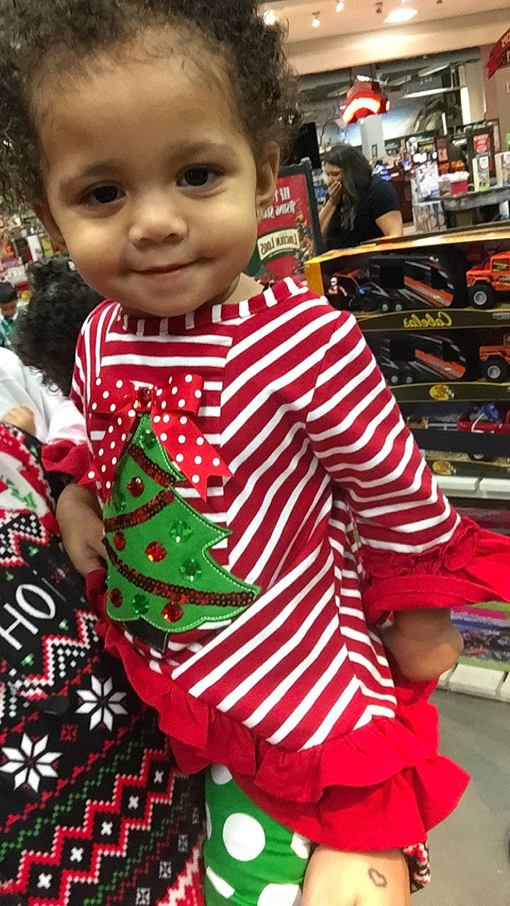 Zarianna is registered to the contest to win money with this photo: child, christmas, girl, holiday, pattern, person, plaid, product, textile, toddler