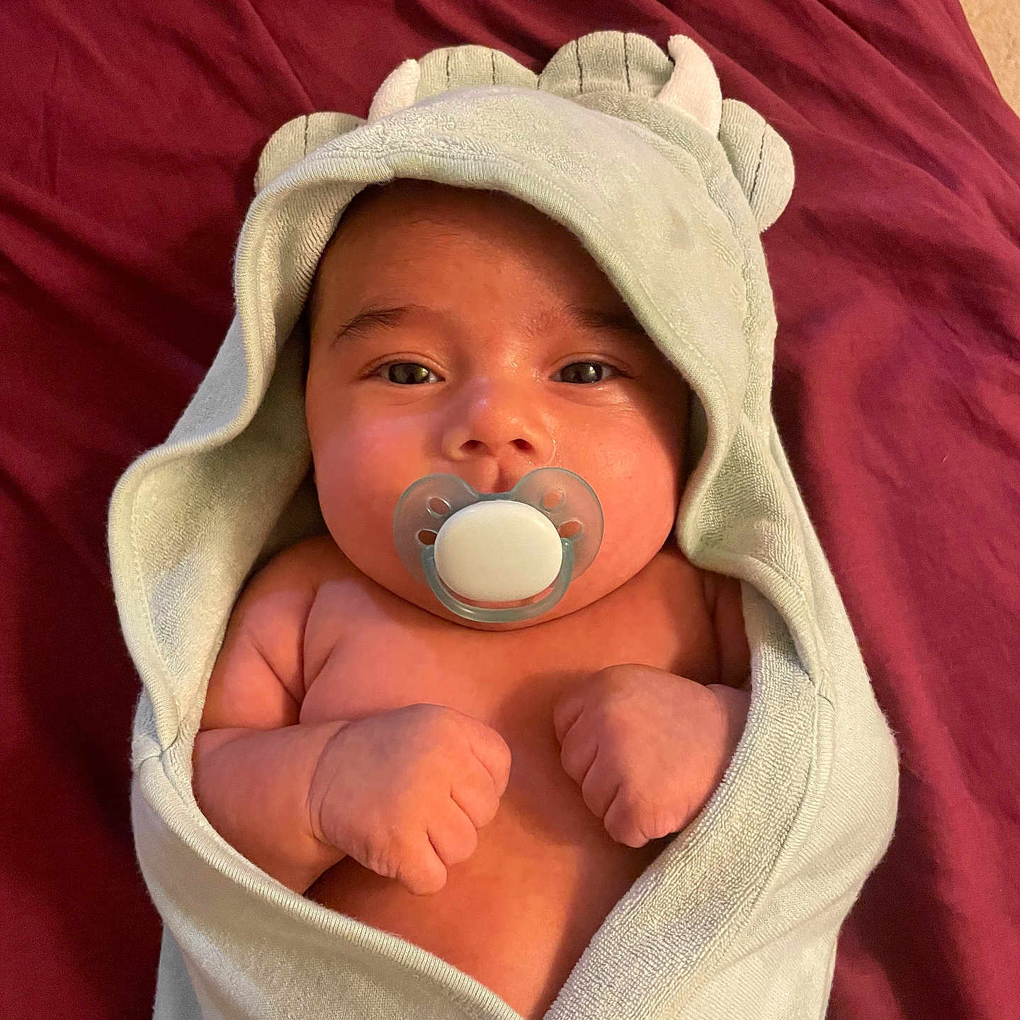 Jerzain Eden joined the competition — help win amazing prizes! baby, blanket, bodypart, bonnet, clothing, face, finger, hand, hat, head, hood, hoodie, knitwear, newborn, person, photography, portrait, sweater, sweatshirt, towel