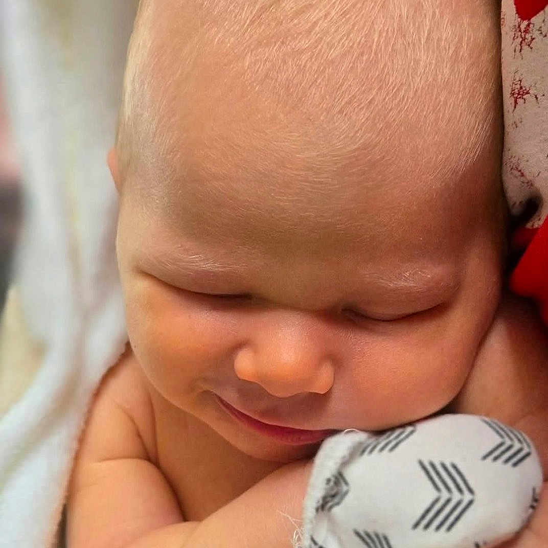 Wrenn joined the competition — help win amazing prizes! baby, ball, baseball, baseballball, blanket, face, happy, head, newborn, person, photography, portrait, quilt, skin, sleeping, smile, sport, towel