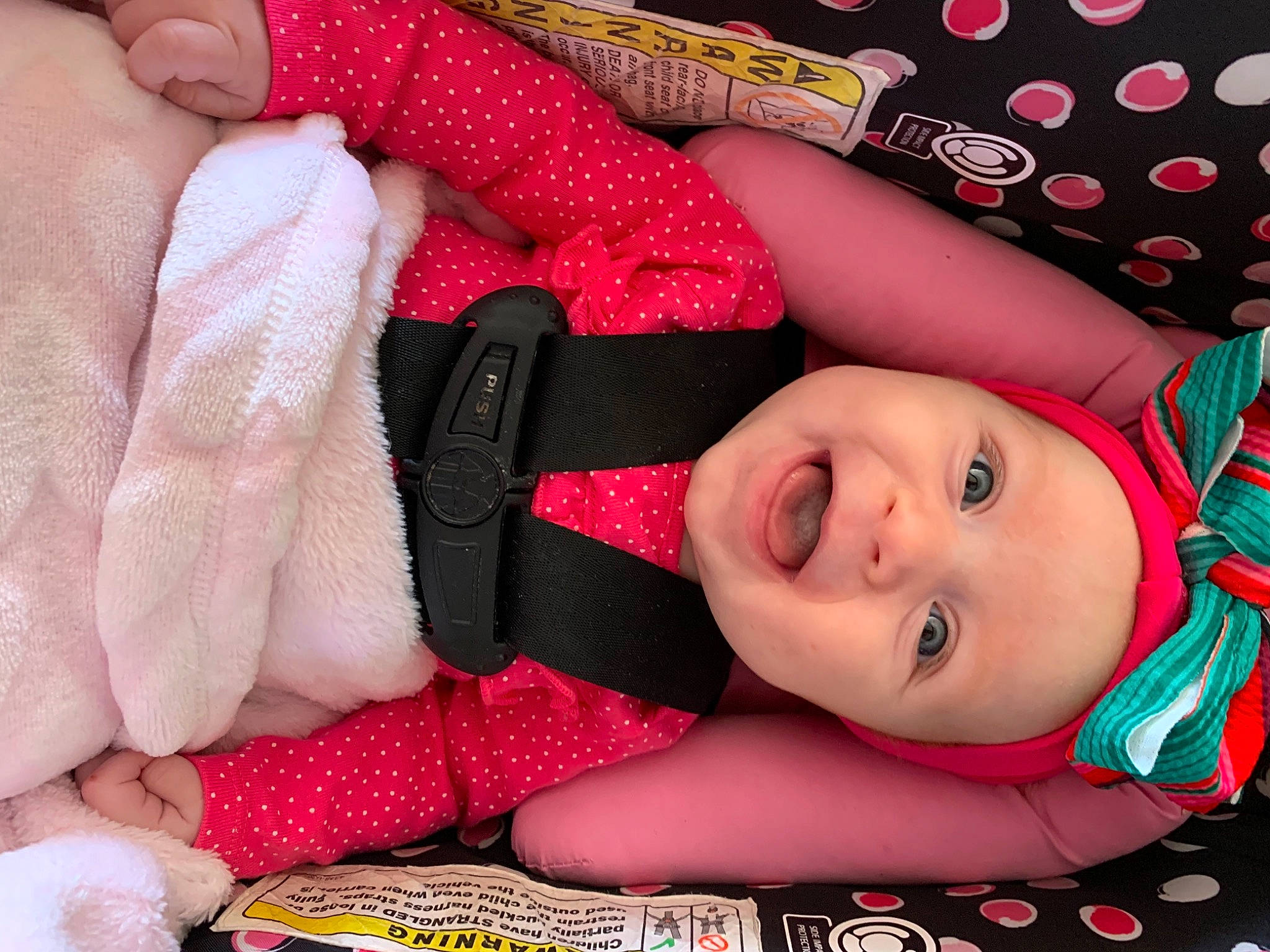 Ophelia joined the competition — help win amazing prizes! baby, baby_products, baby_toddler_clothing, cheek, child, comfort, eyelash, fashion_accessory, finger, happy, headwear, lip, magenta, pattern, person, pink, red, skin, smile, textile