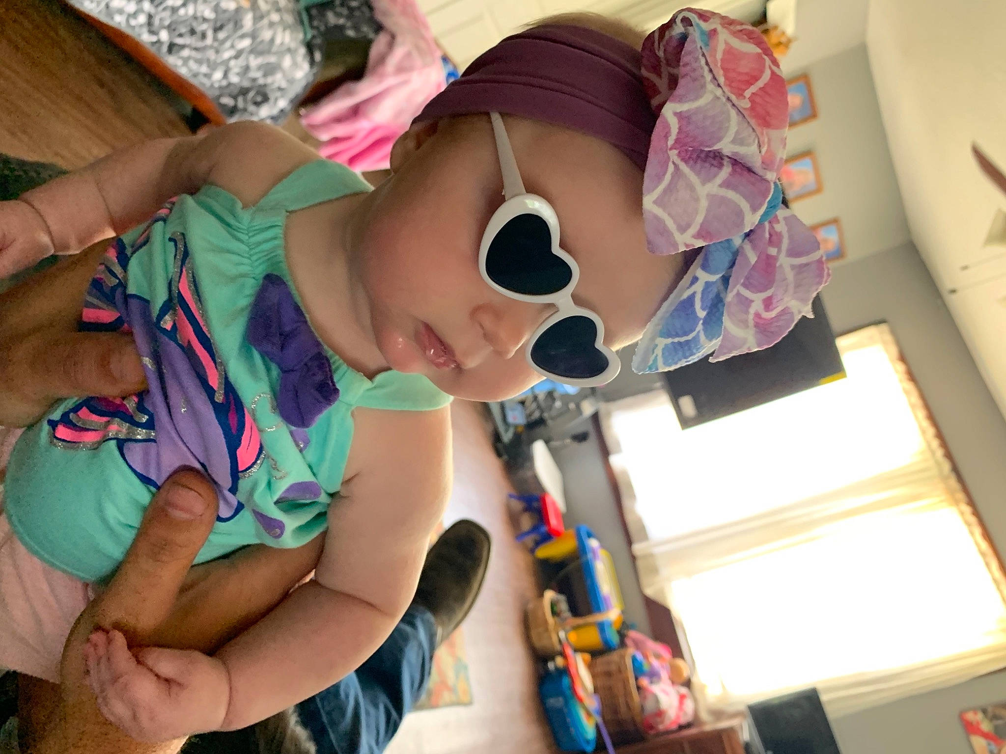 Ophelia is registered to the contest to win money with this photo: art, child, elbow, event, eyewear, fun, goggles, happy, leisure, mouth, party, pattern, person, room, sunglasses, t_shirt, thigh, toddler, vacation, vision_care