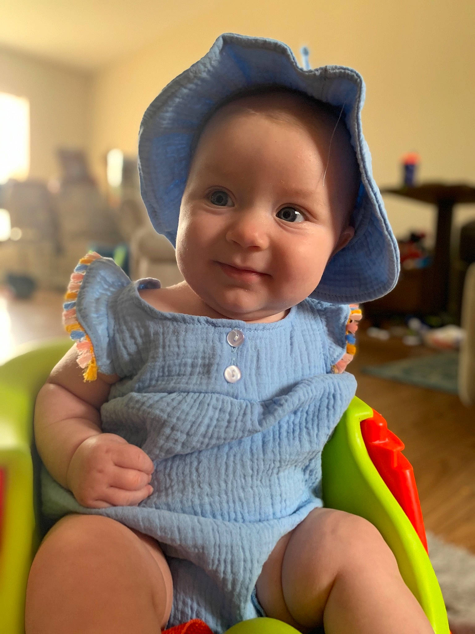 Ophelia joined the competition — help win amazing prizes! baby, baby_products, baby_toddler_clothing, cap, chair, cheek, child, electric_blue, fashion_accessory, fun, happy, hat, human_body, joy, lap, person, sitting, skin, smile, standing