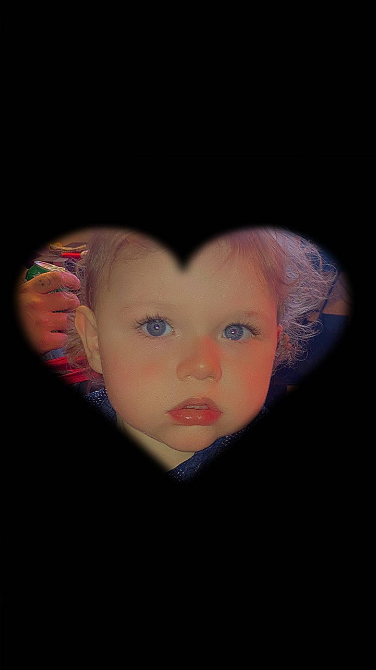 Nikko is registered to the contest to win money with this photo: art, bangs, black_hair, cheek, child, circle, darkness, doll, eyelash, fashion_accessory, flash_photography, fun, fur, iris, lip, nose, person, portrait, portrait_photography, toddler