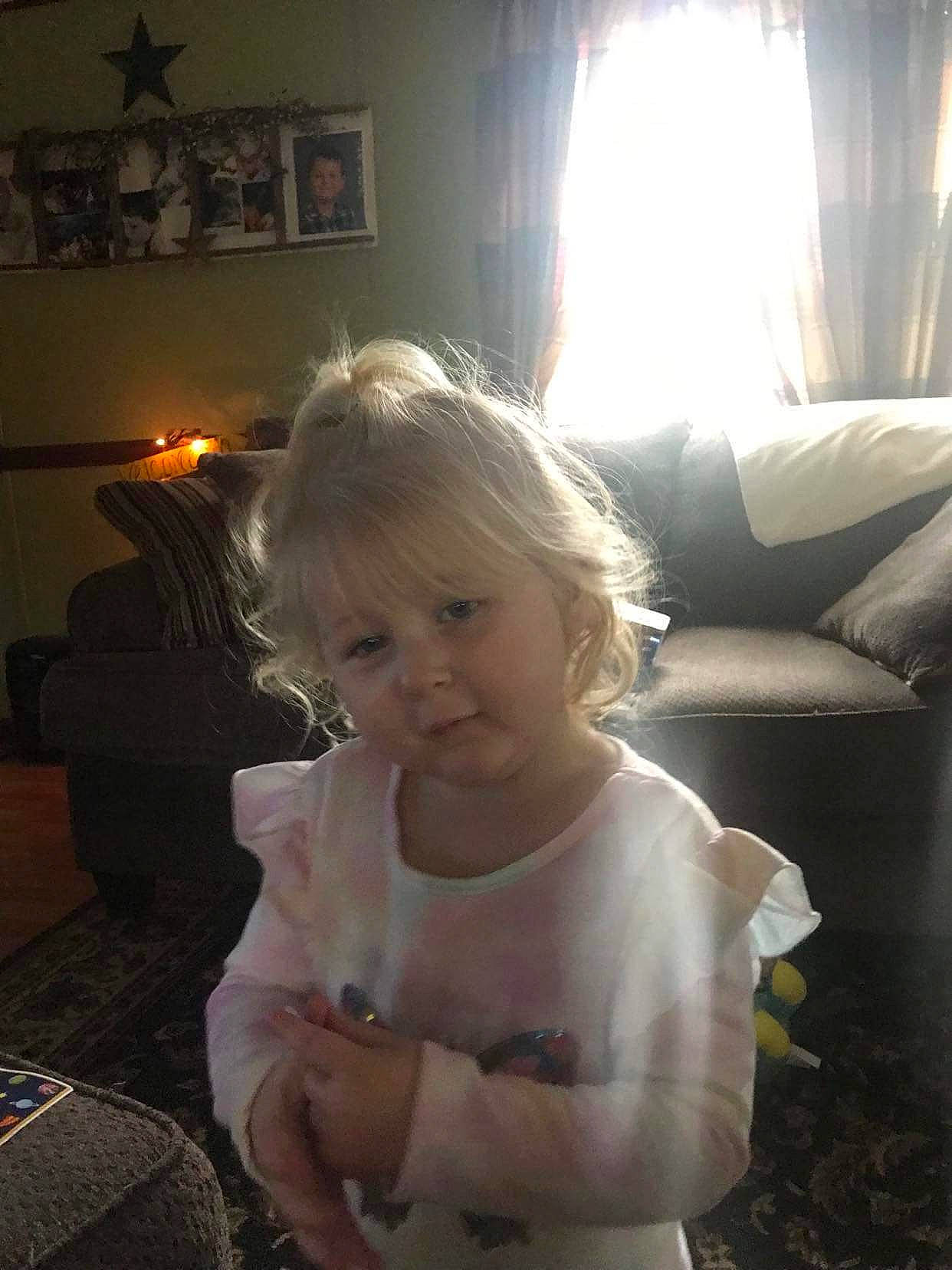 Riley joined the competition — help win amazing prizes! baby_toddler_clothing, curtain, dress, eye, facial_expression, flash_photography, fun, happy, iris, lamp, light, lighting, living_room, person, picture_frame, shoulder, sitting, sunlight, tints_and_shades, toddler