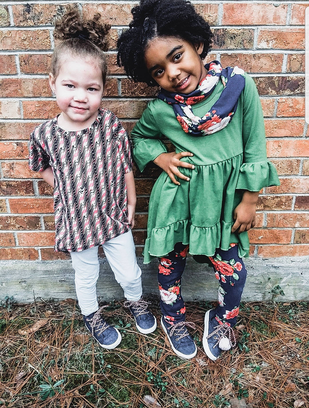 Laiyah joined the competition — help win amazing prizes! baby_toddler_clothing, brick, brickwork, child, face, footwear, grass, green, happy, head, joy, outerwear, pattern, people, people_in_nature, person, shoe, sitting, sleeve, smile