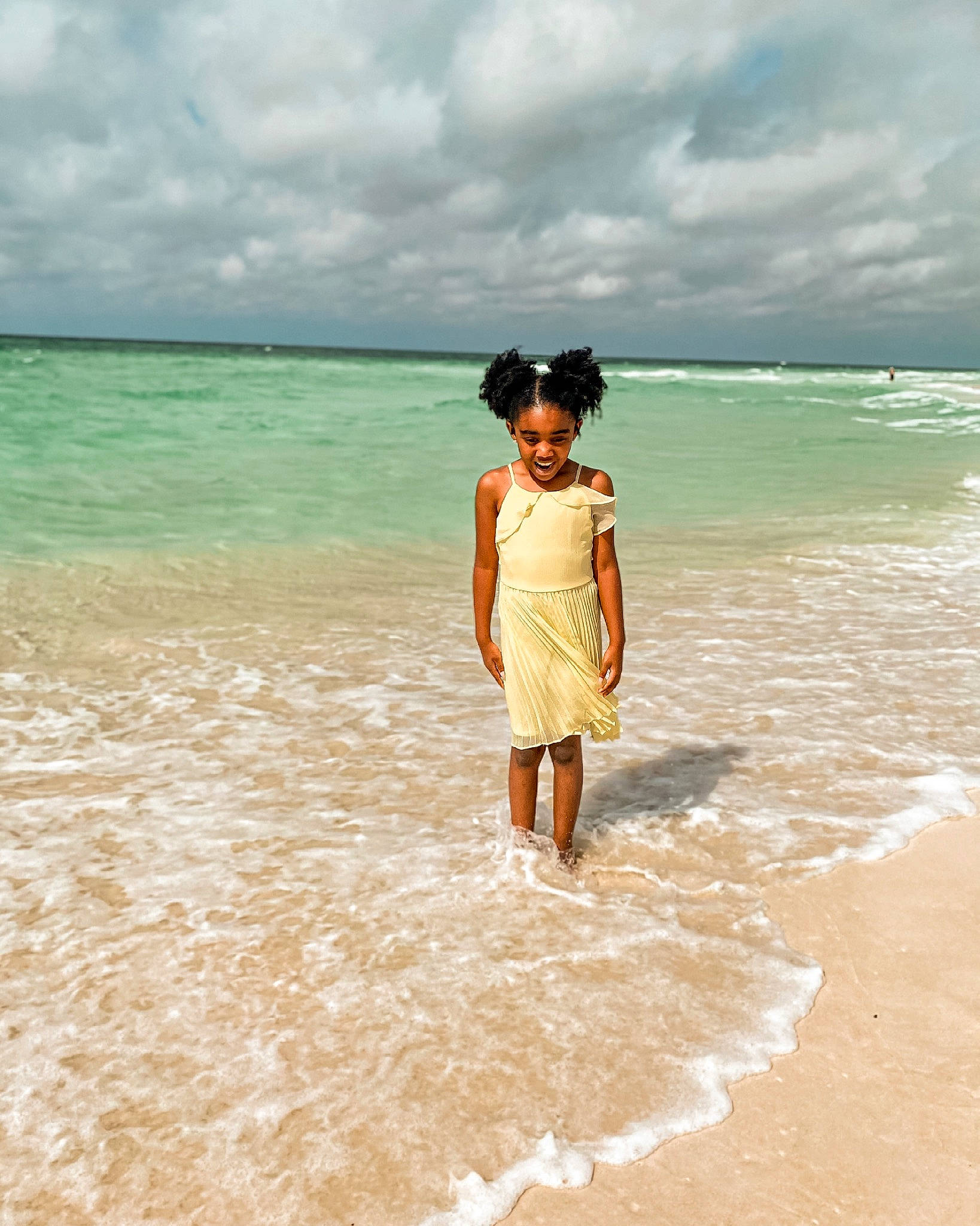 Laiyah is registered to the contest to win money with this photo: beach, cloud, coastal_and_oceanic_landforms, fun, happy, holiday, horizon, joy, landscape, leisure, morning, natural_environment, nature, people_in_nature, people_on_beach, person, sand, shore, sky, travel