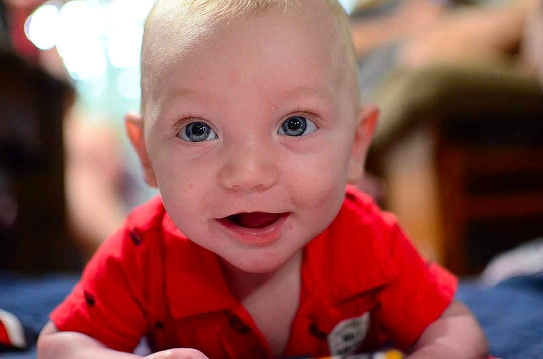 Pierce joined the competition — help win amazing prizes! baby, cheek, child, eye, face, facial_expression, head, lip, mouth, nose, person, skin, smile, toddler, tummy_time