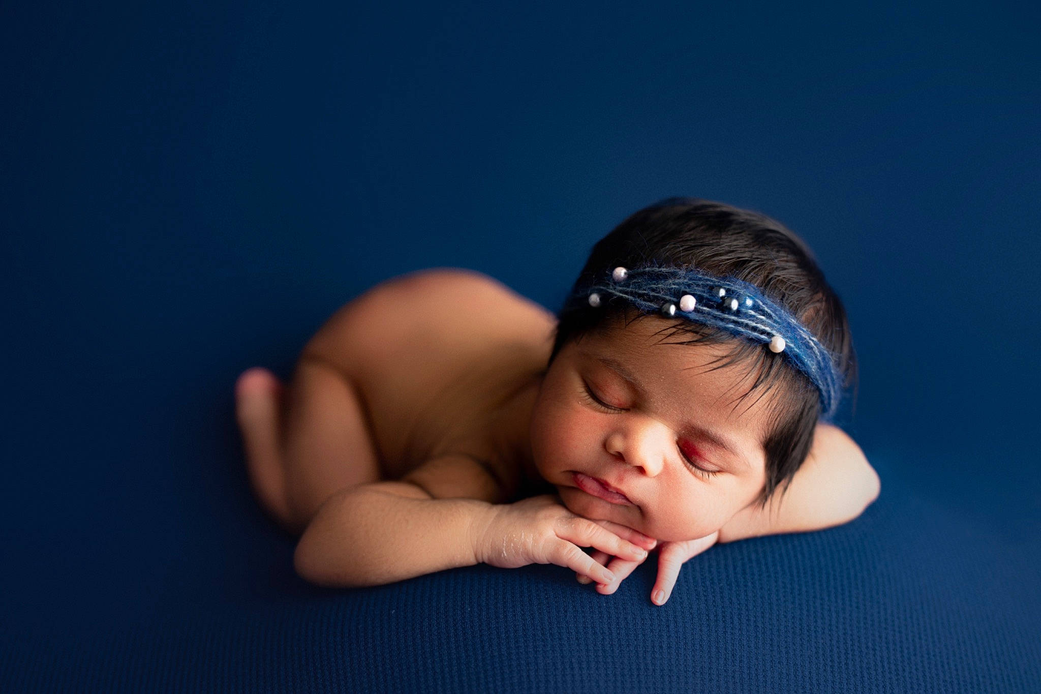 Mishka is registered to the contest to win money with this photo: baby, baby_toddler_clothing, barefoot, bathing, black_hair, cap, elbow, electric_blue, eye, eyelash, finger, flash_photography, flooring, gesture, hand, happy, headgear, headpiece, person, toddler