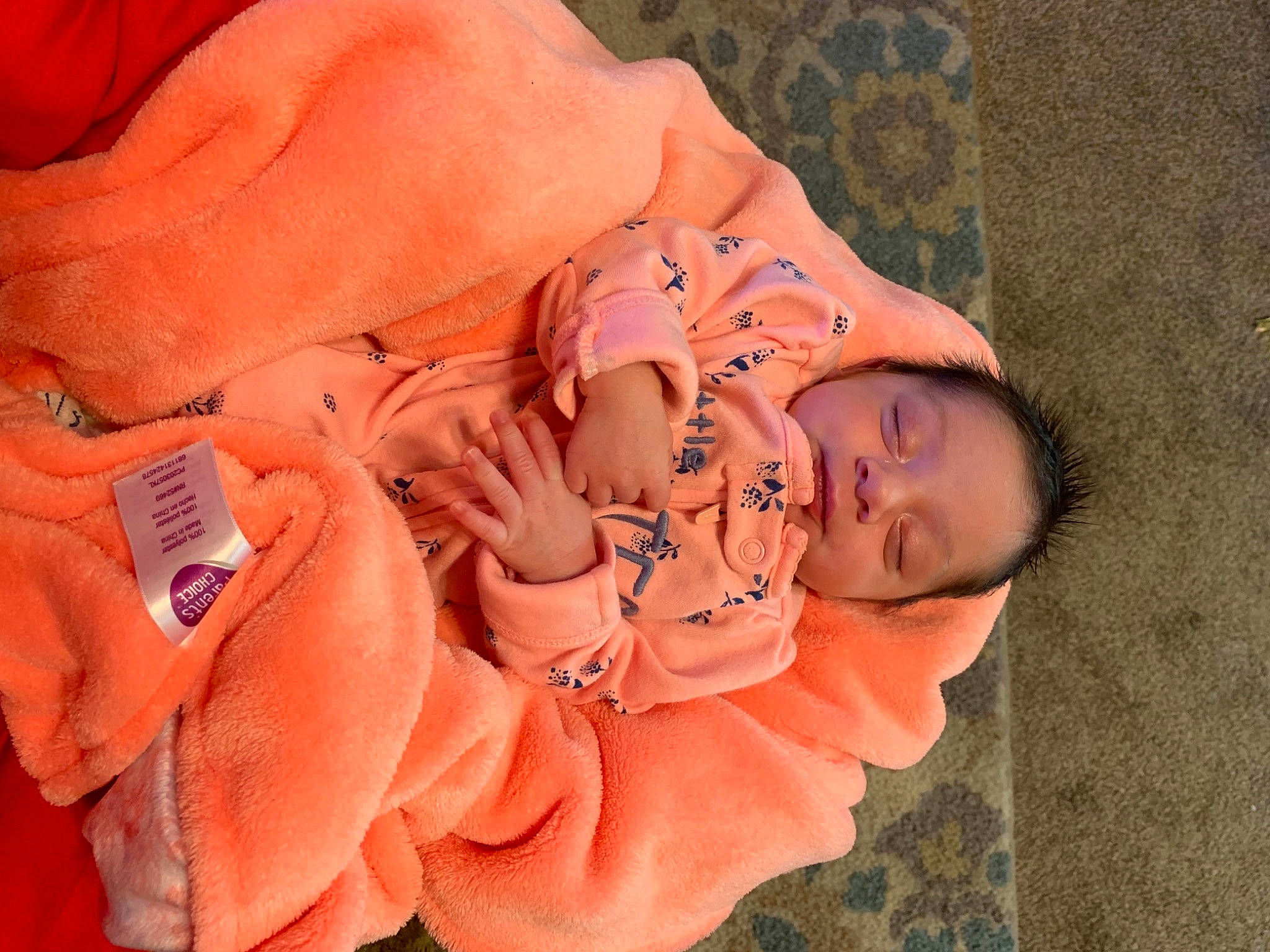 Anayah is registered to the contest to win money with this photo: abdomen, arm, baby, baby_products, baby_toddler_clothing, comfort, eye, finger, hand, human_body, leg, lifejacket, nail, orange, peach, person, skin, thumb, toddler, trunk
