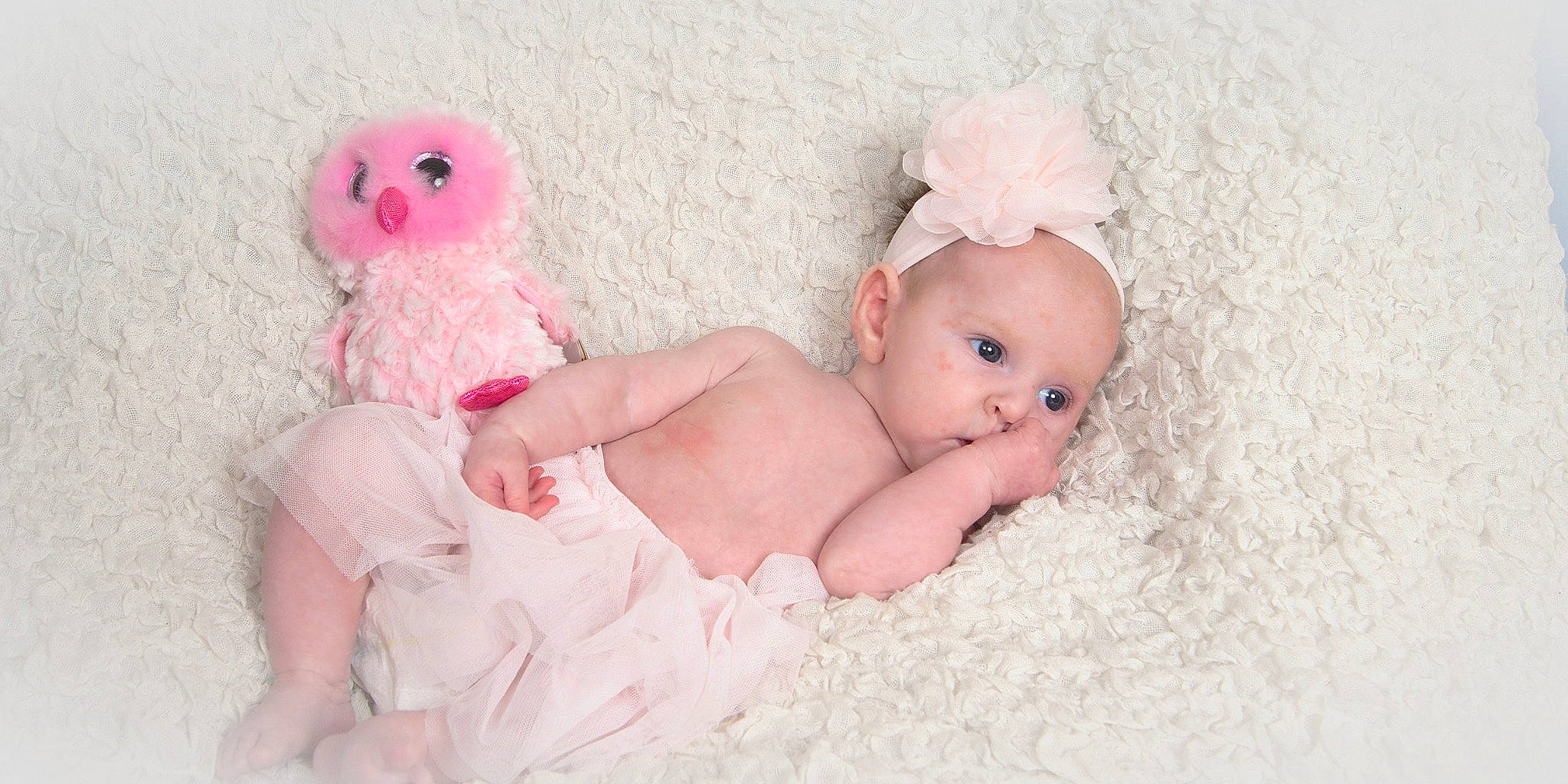Kinslee Rae is registered to the contest to win money with this photo: baby, baby_products, baby_toddler_clothing, child, hair_accessory, headgear, person, photograph, pink, product, skin, stomach, toddler