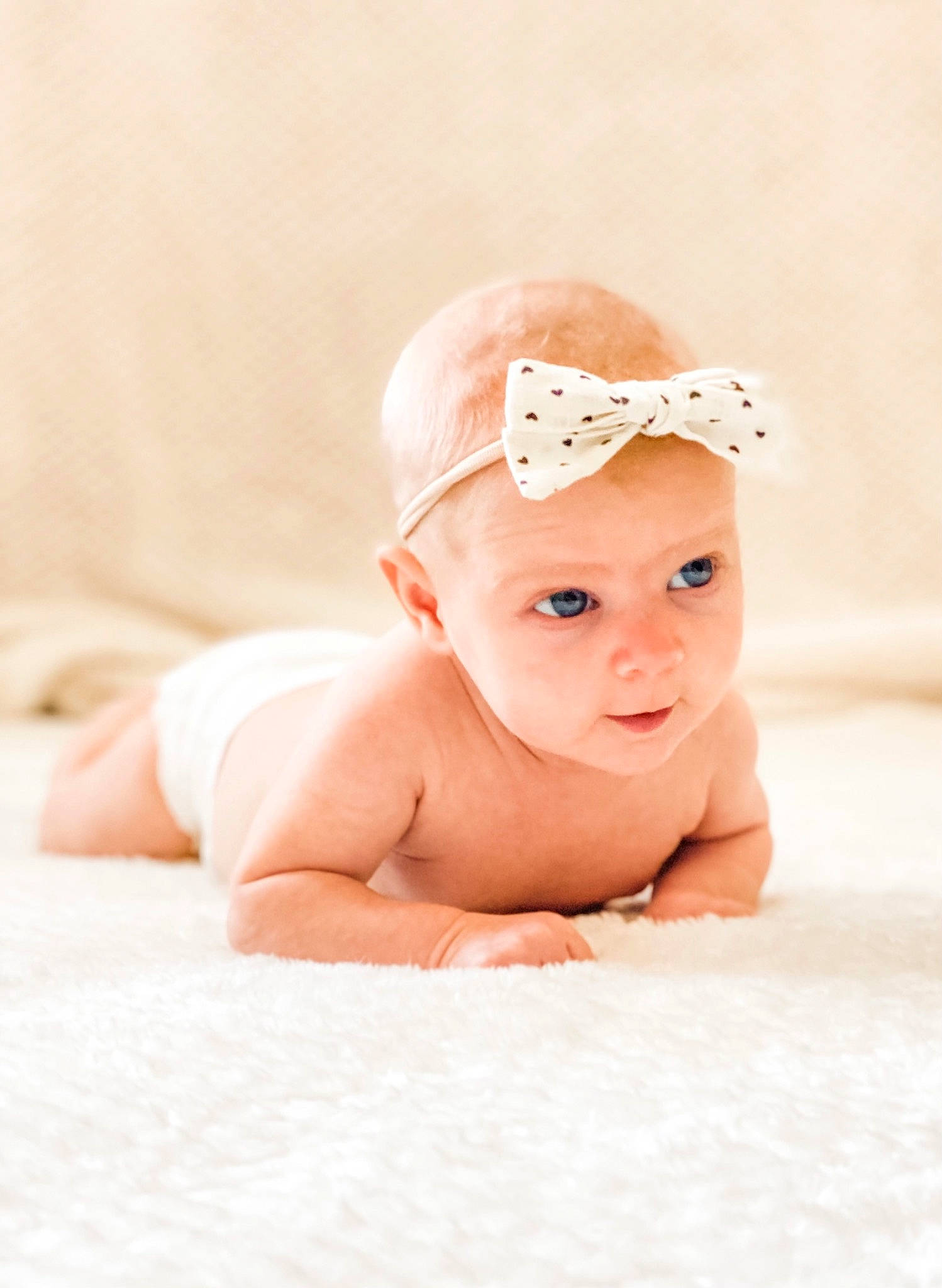 Willow is registered to the contest to win money with this photo: art, baby, baby_sleeping, baby_toddler_clothing, cap, child, comfort, fashion_accessory, flash_photography, hair_accessory, happy, headband, headgear, headpiece, headwear, jewellery, linens, peach, person, portrait_photography